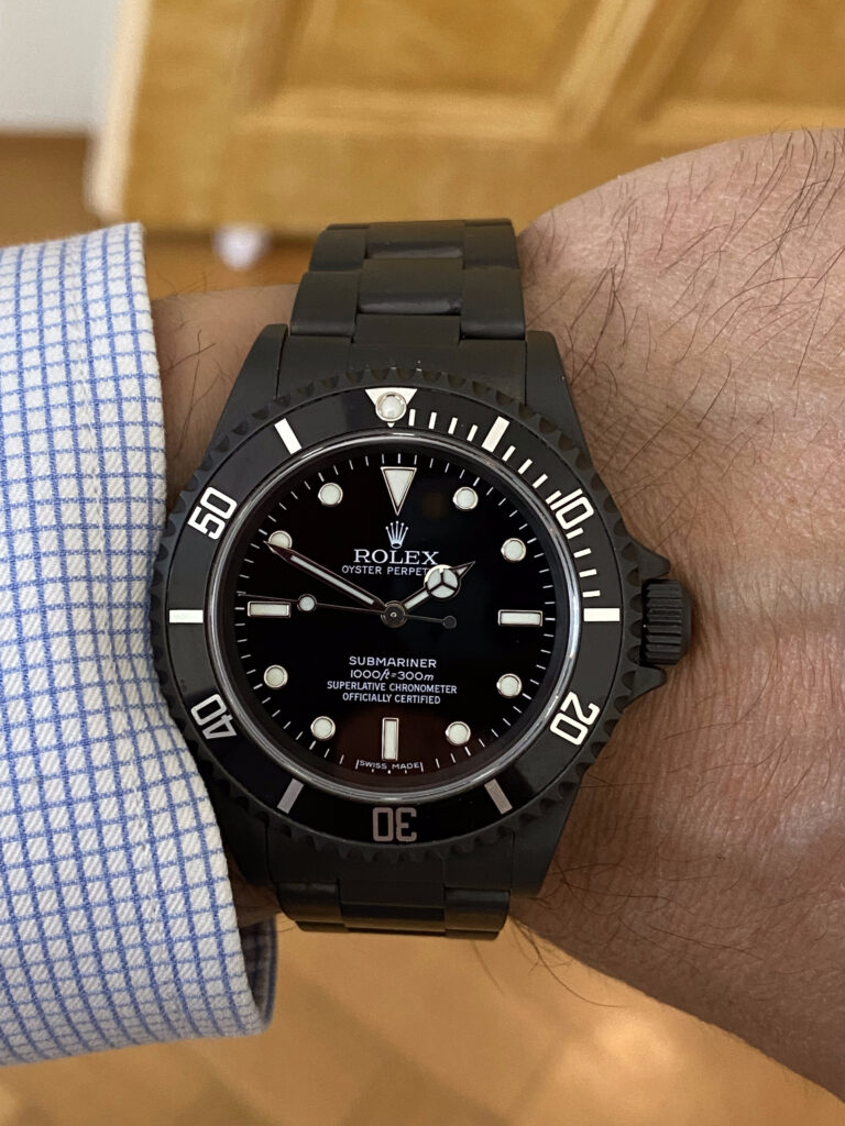 Rolex Oyster Perpetual Submariner PVD noir (Vendu)